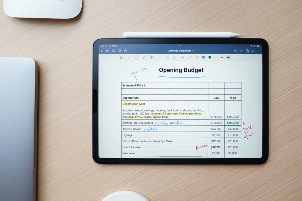 Budgeting and cash flow forecasting: key to your business success - a tablet displaying "opening budget"