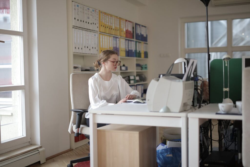Essential bookkeeping practices for a start-up - Working Woman in White Long Sleeve Shirt