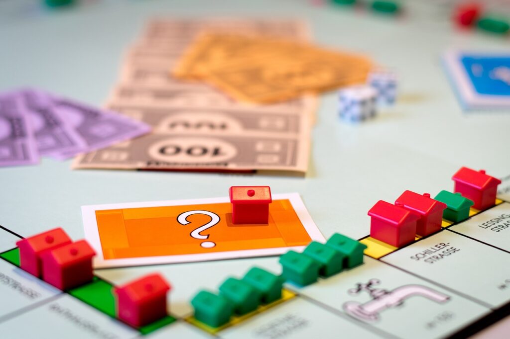 Business Update – 8 February 2023 - houses on a Monopoly board