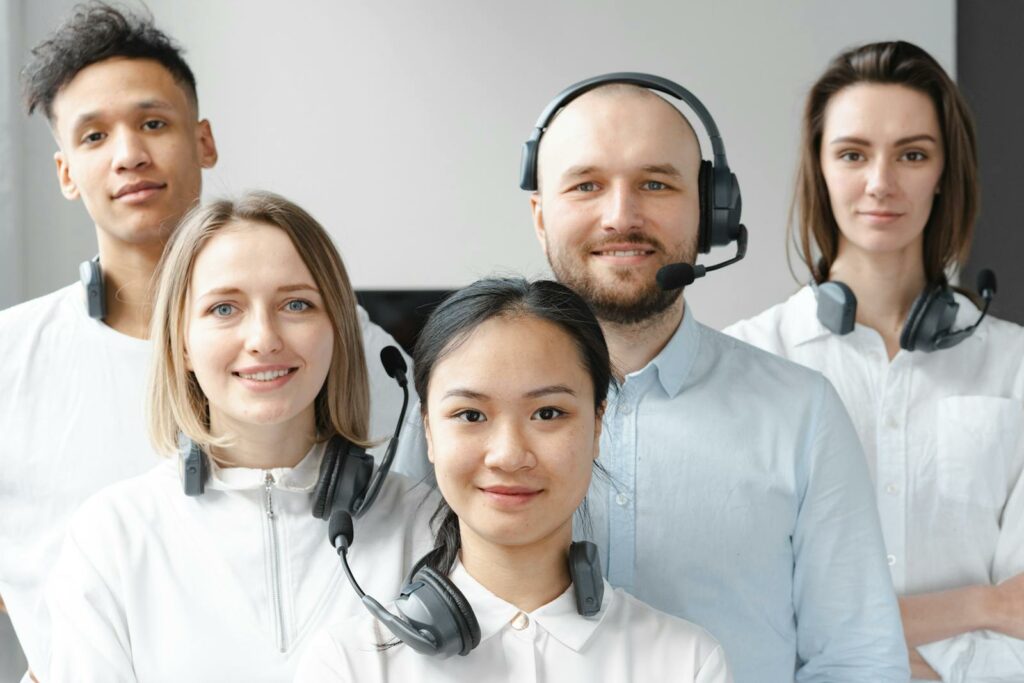 Unlocking the secrets to stellar customer service - Smiling Call Centre Agents posing for Camera