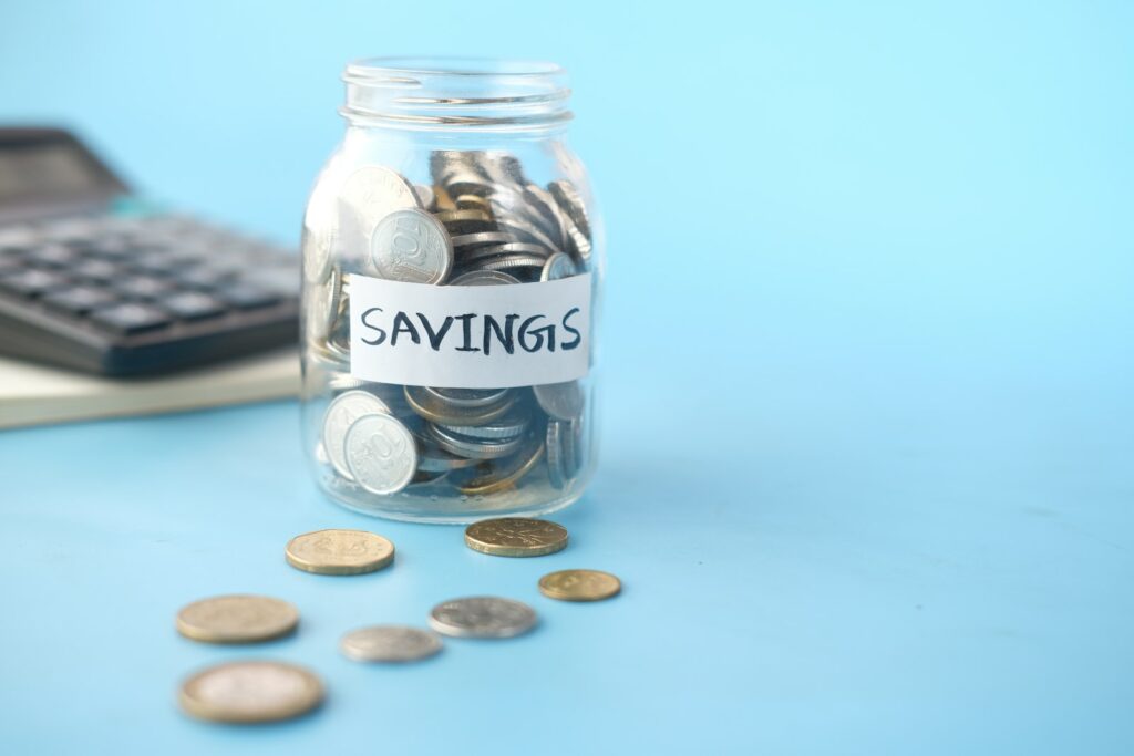 Essential steps to managing your family finances - Clear Glass Jar With Silver Coins