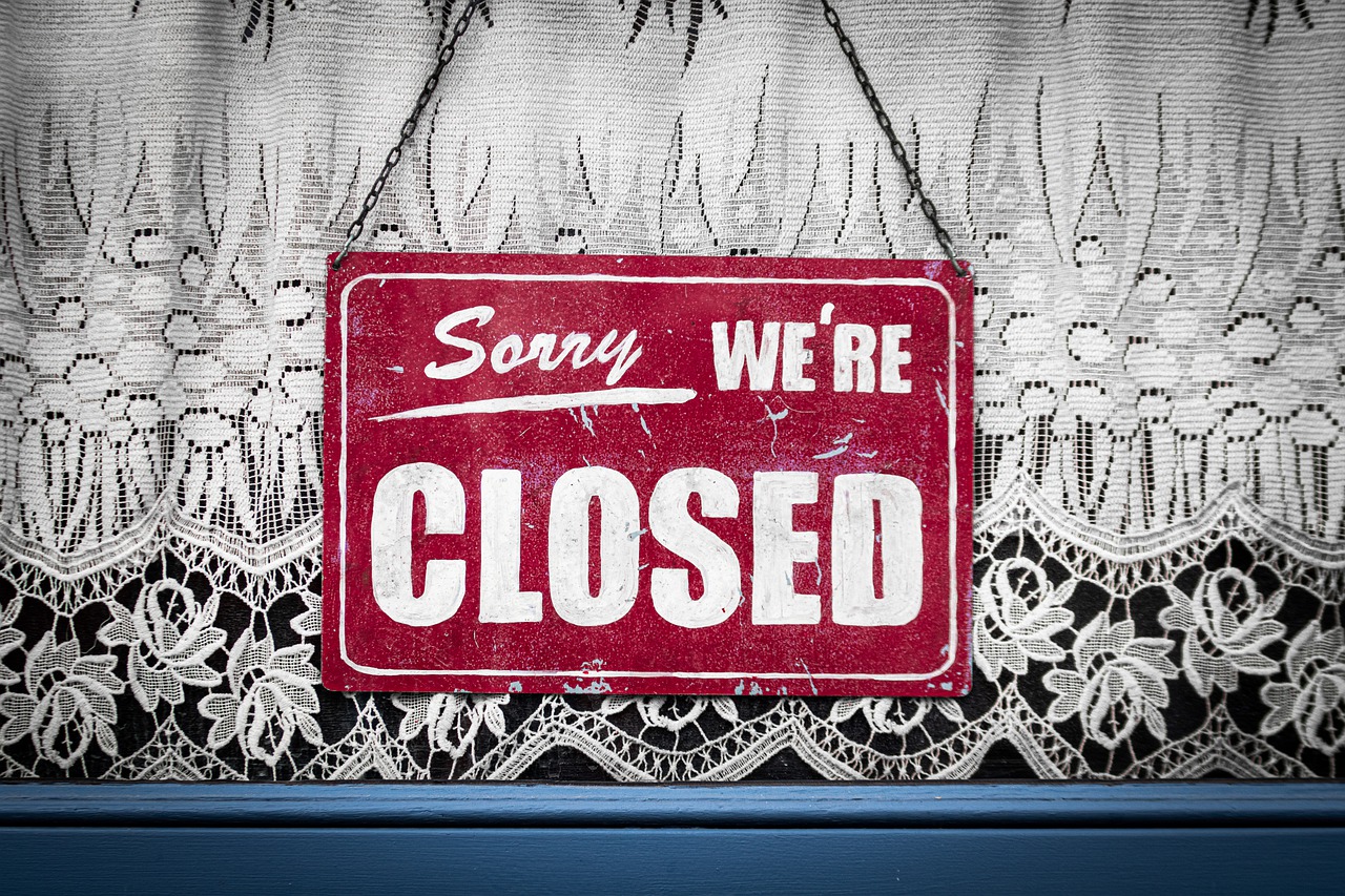 COVID-19 updates - a sign reading "Sorry we're CLOSED"