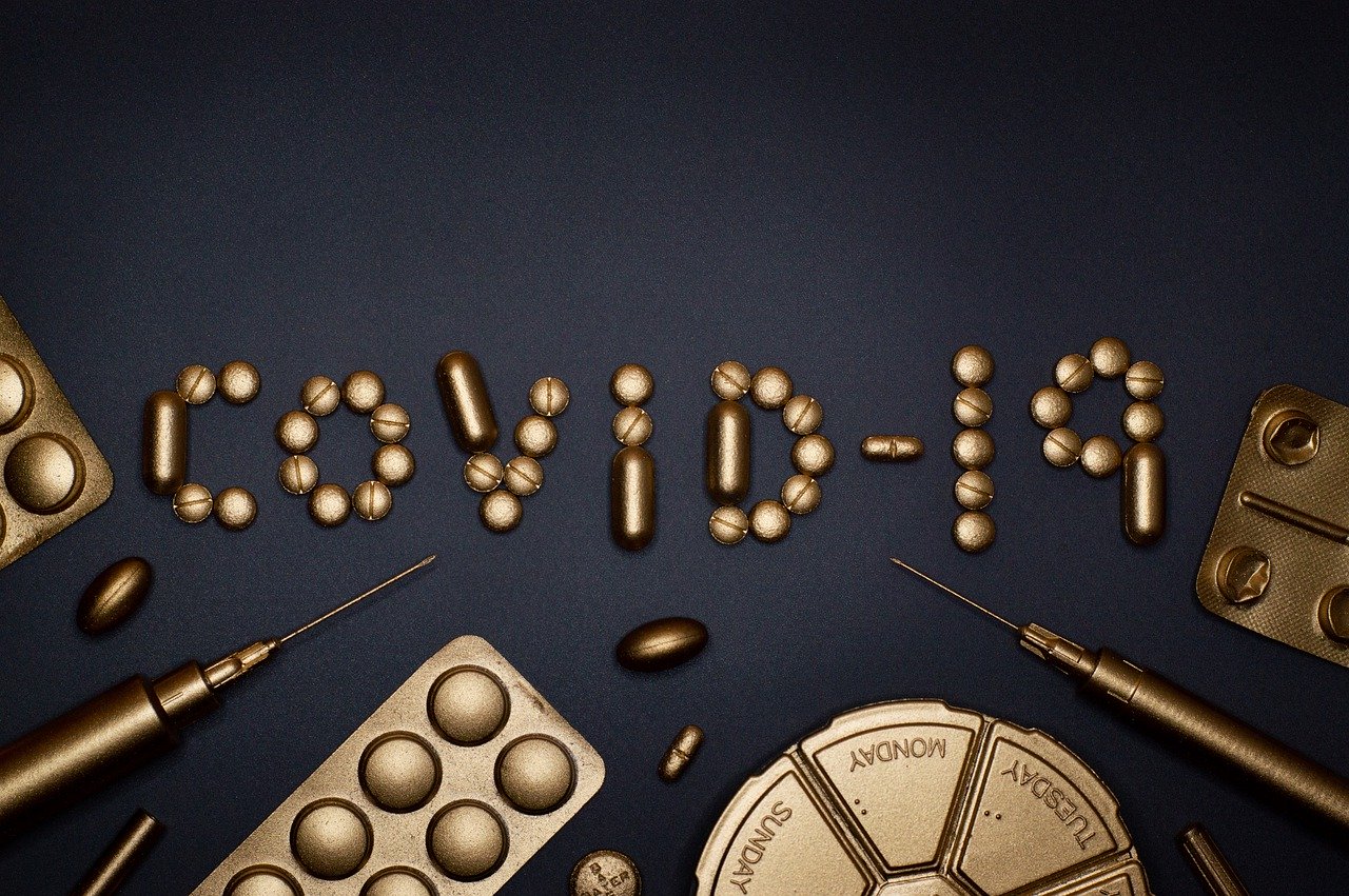 COVID-19 Business Update – 28 May 2020 - "COVID-19" spelled out in tablets and medicine capsules