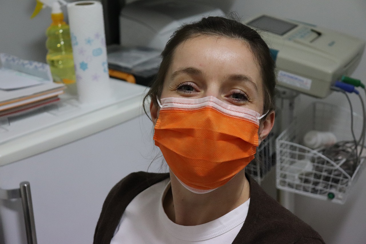 COVID-19 Business Update - 31 August 2020 - a woman with a face mask in a doctor's surgery