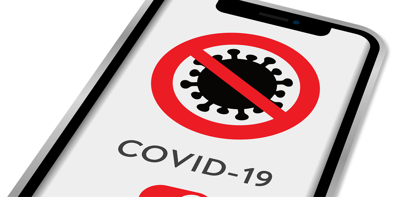 Covid-19 Business Updates - 3 December 2020 - a mobile phone with a Covid-19 tracing app