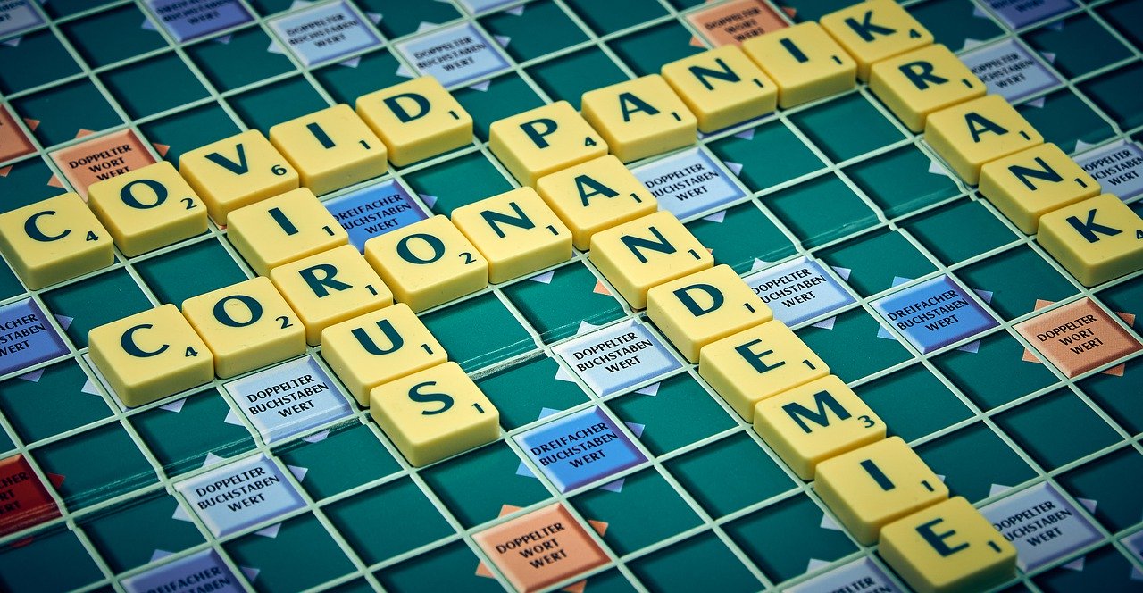 Covid 19 update 10 August - a game board spelling out words relating to the Coronavirus pandemic