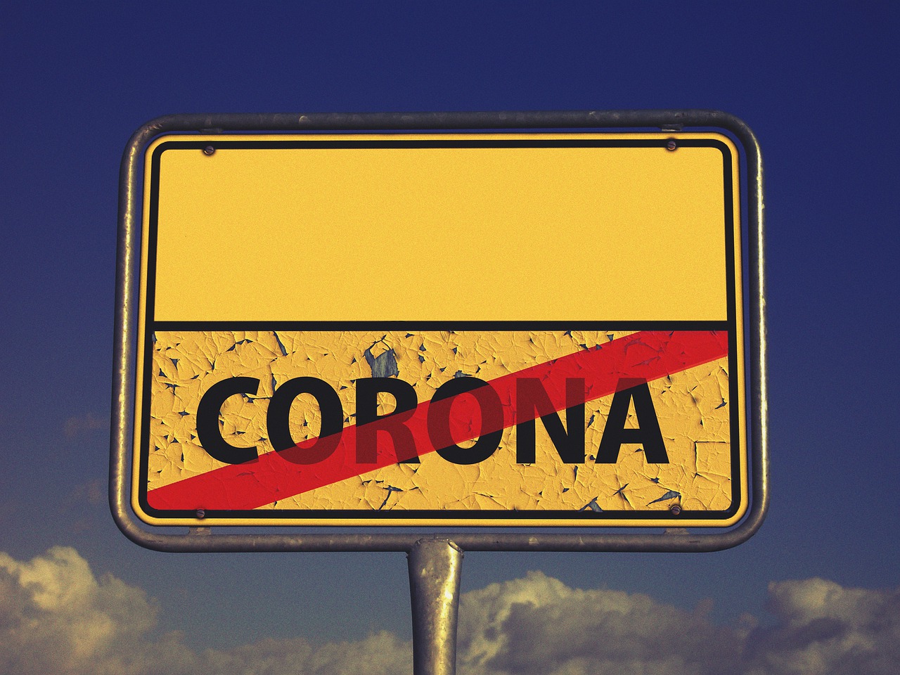 COVID-19 Business Update – 28 January 2021 - A warning signboard with the word "Corona" with a line through it.