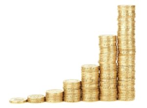 4 Common sense financial tips to make your money work for you - towers of coins grow expotentially taller from left to right.