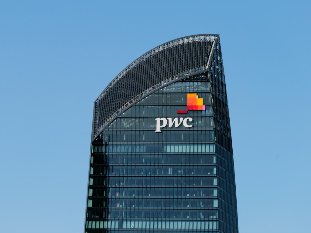 Business Update – 22 June 2023 - a tall building with a pwc logo on top of it