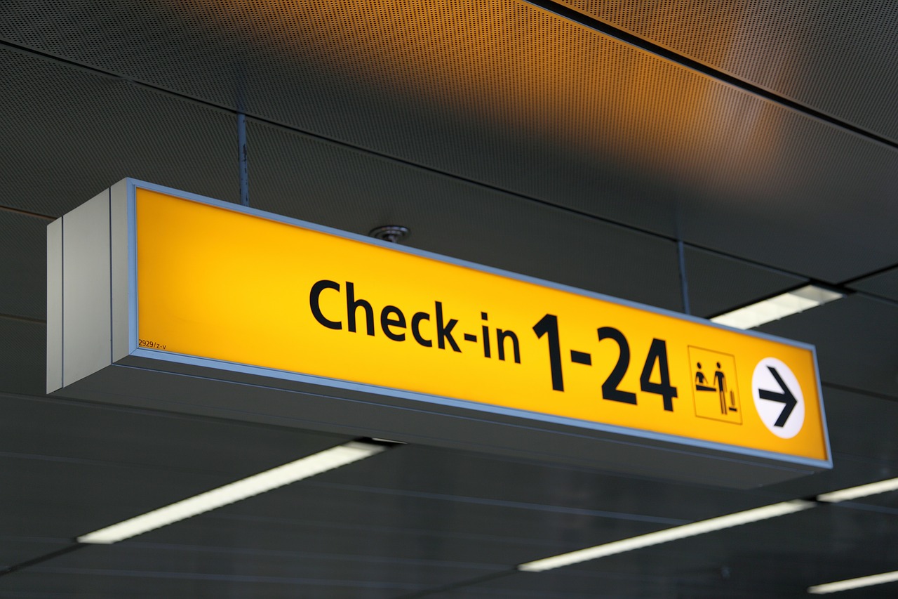 Business Update – 28 October 2021 - an international terminal check-in sign