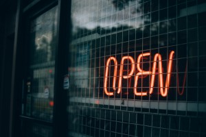 Starting business - A neon “open” sign at a storefront