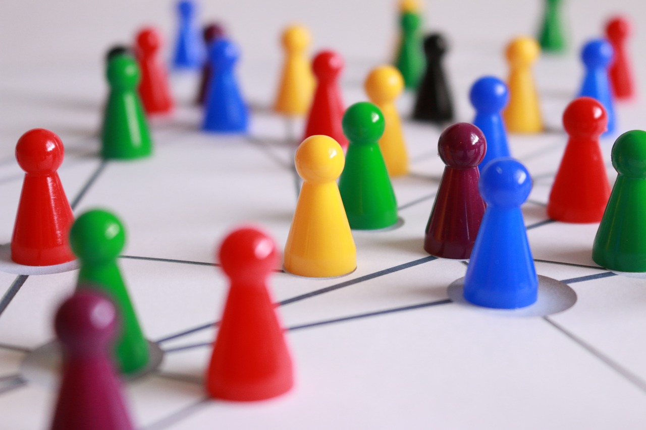 Growing your network without networking events - coloured pawns connected by straight lines