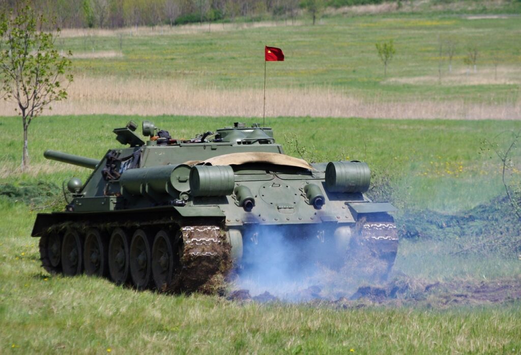 Business Update – 7 March 2022 - a Russian tank spewing exhaust fumes.
