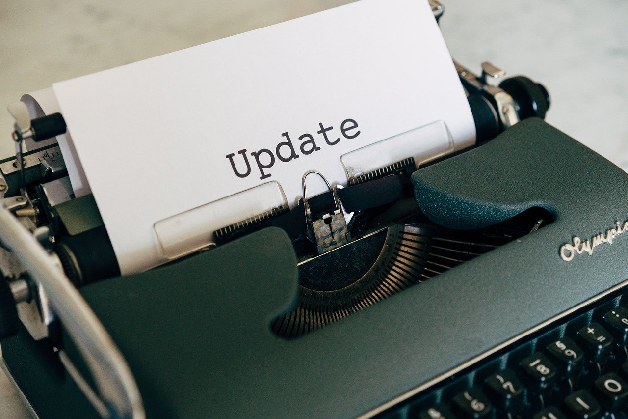 Business Update – 8 April 2022 - a typewriter with the word "Update" on the paper.