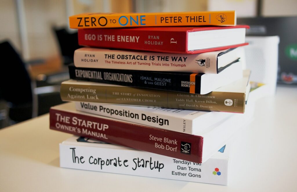 The Power of Core Values in Business - pile of assorted business title books