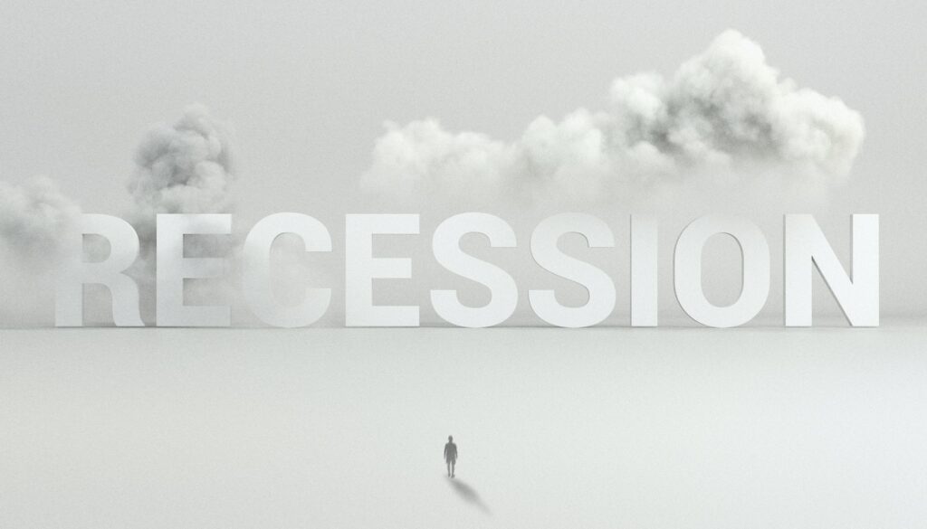 Business Update – 12 October 2023 - The word RECESSION on the horizon under a cloudy sky